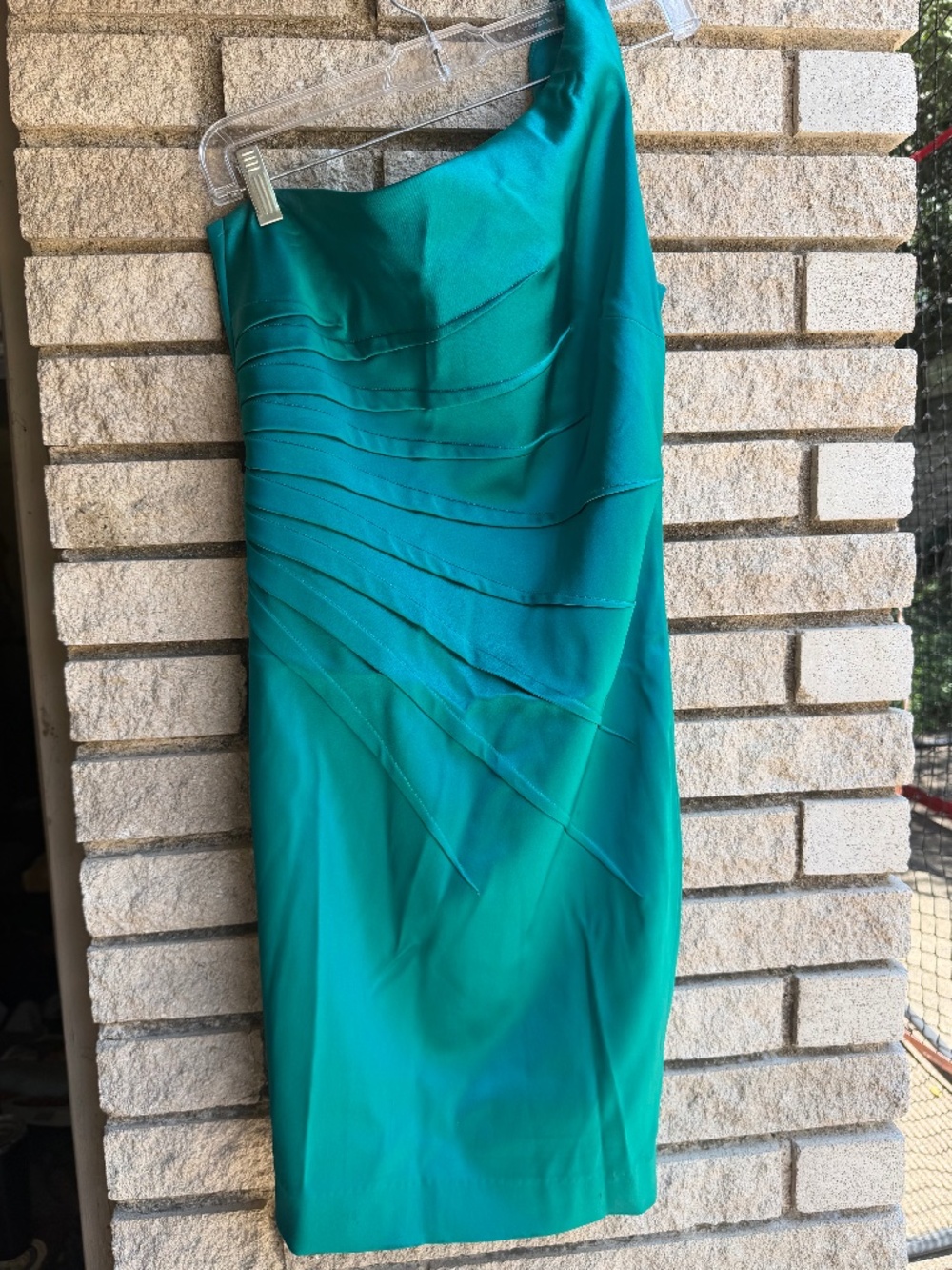 Asymmetrical emerald dress